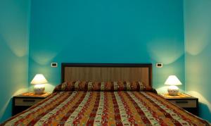 Postel nebo postele na pokoji v ubytování B&B Villa Maria + 37 fotografií