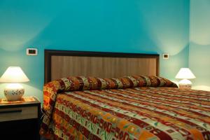 Postel nebo postele na pokoji v ubytování B&B Villa Maria