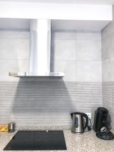 Kuchyň nebo kuchyňský kout v ubytování Entre Patios La Victoria