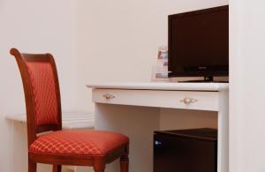 TV a/nebo společenská místnost v ubytování B&B Villa Maria