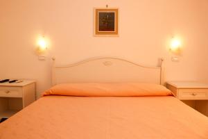 Postel nebo postele na pokoji v ubytování B&B Villa Maria