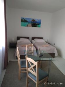 Postel nebo postele na pokoji v ubytování Villa Eleven