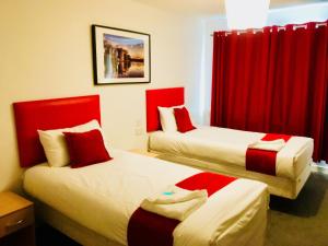 Postel nebo postele na pokoji v ubytování Hotel Express Newcastle Gateshead