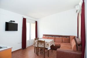 TV a/nebo společenská místnost v ubytování Apartmani Lasta