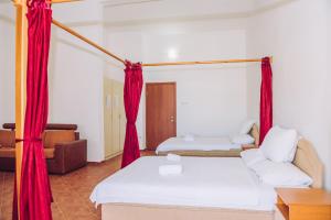 Postel nebo postele na pokoji v ubytování Apartmani Lasta