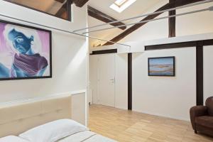 Ένα ή περισσότερα κρεβάτια σε δωμάτιο στο Mitodea - Residenza d'Epoca