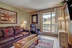 Χώρος καθιστικού στο Fp114 Foxpine Inn Condo