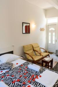Posteľ alebo postele v izbe v ubytovaní Dino and Jele Apartments