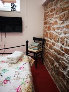 Postel nebo postele na pokoji v ubytování Littel studio Franceska