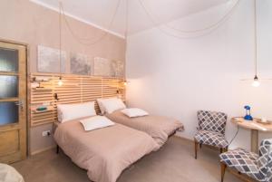 מיטה או מיטות בחדר ב-La Casa di Bianca