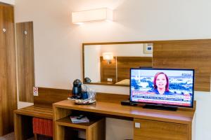 TV a/nebo společenská místnost v ubytování Hotel Burgas