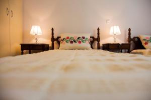 Ένα ή περισσότερα κρεβάτια σε δωμάτιο στο Villa O