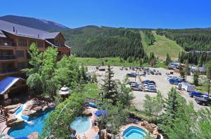 an aerial view of a resort with a water park at 8890 The Springs Condo in Keystone