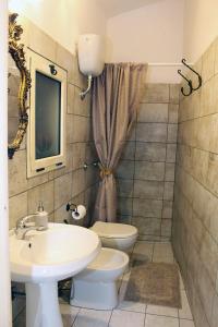 Een badkamer bij B&B Palazzo Sambiasi