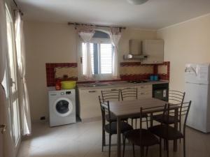 A kitchen or kitchenette at Casa Vacanza Miramare