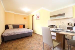 Postel nebo postele na pokoji v ubytování Apartmány včelka
