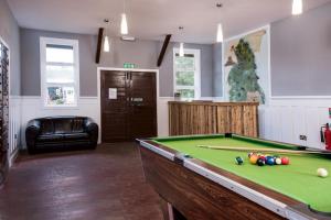 a billiard room with a pool table in it at Brown Rigg Lodges in Bellingham