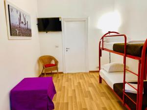 COMFORT INN ROMA TERMINI客房内的一张或多张床位