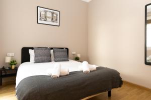 Postel nebo postele na pokoji v ubytování Key Barcelona HOUSING (Carrer Girona)