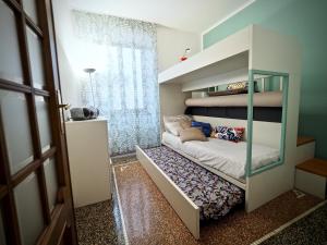 Posteľ alebo postele v izbe v ubytovaní CASA DELL AGNELLO ACQUARIO - GENOVABNB it