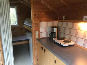 Kuchyň nebo kuchyňský kout v ubytování Egtved Camping Cottages