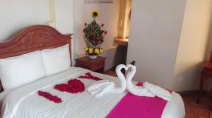 Postel nebo postele na pokoji v ubytování Hotel Meson del Mar