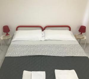 Krevet ili kreveti u jedinici u objektu Appartamenti Le Mimose