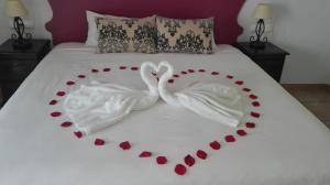 Łóżko lub łóżka w pokoju w obiekcie Hotel Andalou