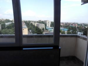 a view of a city from a window at var-ketili in Tbilisi City