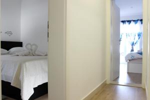 Postel nebo postele na pokoji v ubytování Apartment Pino