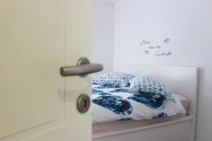 Postel nebo postele na pokoji v ubytování Apartment Pino