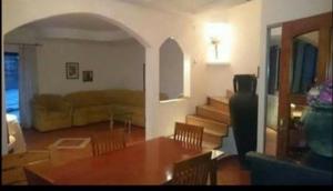 A seating area at Rooms in the apartment-center