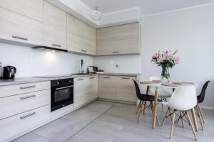 Kuchyňa alebo kuchynka v ubytovaní Elite Apartments Downtown Premium