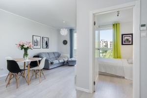 Posteľ alebo postele v izbe v ubytovaní Elite Apartments Downtown Premium