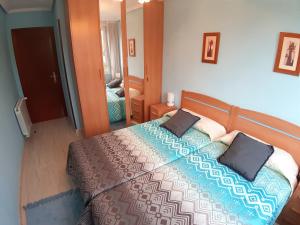 Кровать или кровати в номере Bonito piso en Gama