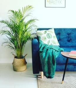 A seating area at Apartament MONSTERA