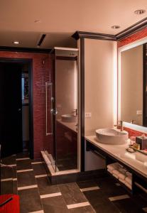 a bathroom with two sinks and a shower at Tulalip Resort Casino in Marysville