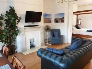 A seating area at The Garden Apartment