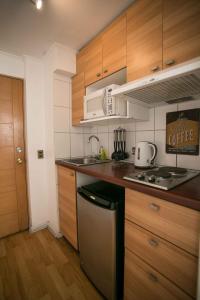 Una cocina o zona de cocina en Apartments Zenteno