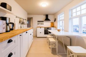 Kuchyň nebo kuchyňský kout v ubytování Holmvik Brygge Nyksund