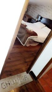 Een bed of bedden in een kamer bij Ferme U San Martinu