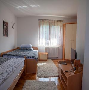 Postel nebo postele na pokoji v ubytování Hana Superior Apartments