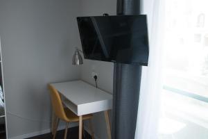 TV o dispositivi per l'intrattenimento presso Sunshine Suites