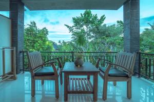 Un balcón o terraza en Gita Maha Ubud Hotel by Mahaputra-CHSE Certified