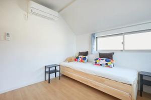Voodi või voodid majutusasutuse koiwa house 3LDK free wifi free parking toas