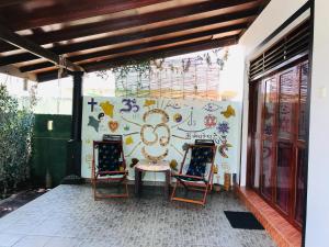 A seating area at Sri Beach Bungalows And Villa