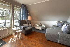Posezení v ubytování Friesen-Lodge Apartments
