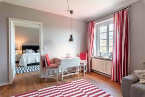 Postel nebo postele na pokoji v ubytování Friesen-Lodge Apartments
