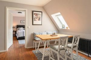 Postel nebo postele na pokoji v ubytování Friesen-Lodge Apartments