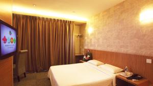 TV a/nebo společenská místnost v ubytování Prescott Hotel Bukit Bintang